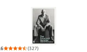 Okładka książki "The Foucault Reader" z portretem autora. Fuko w eleganckim garniturze siedzi na krześle.