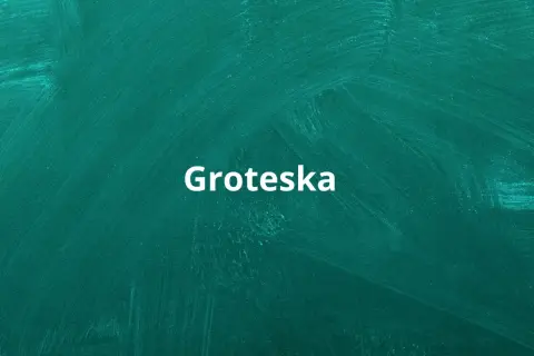 Biały napis "Groteska" na zielonej tablicy. Co to groteska? To styl, który łączy elementy realistyczne z fantastycznymi, często w sposób humorystyczny lub absurdalny.