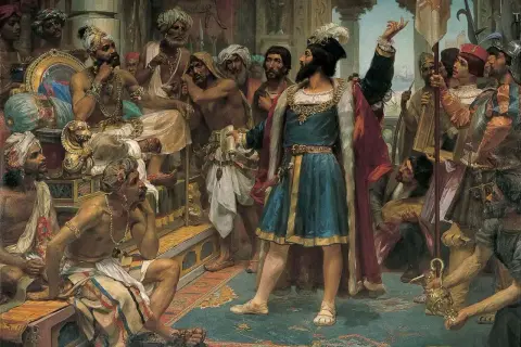 Vasco da Gama przemawia do władcy Indii, otoczony dworzanami i żołnierzami.